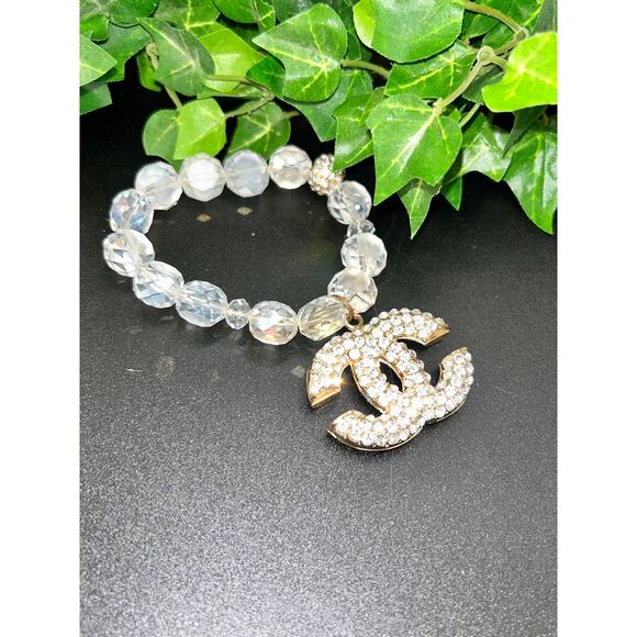 CHANEL Jewelry - Chanel Iridescent AB Beaded Bracelet Crystal CC Logo Crescent Charm Gold Tone